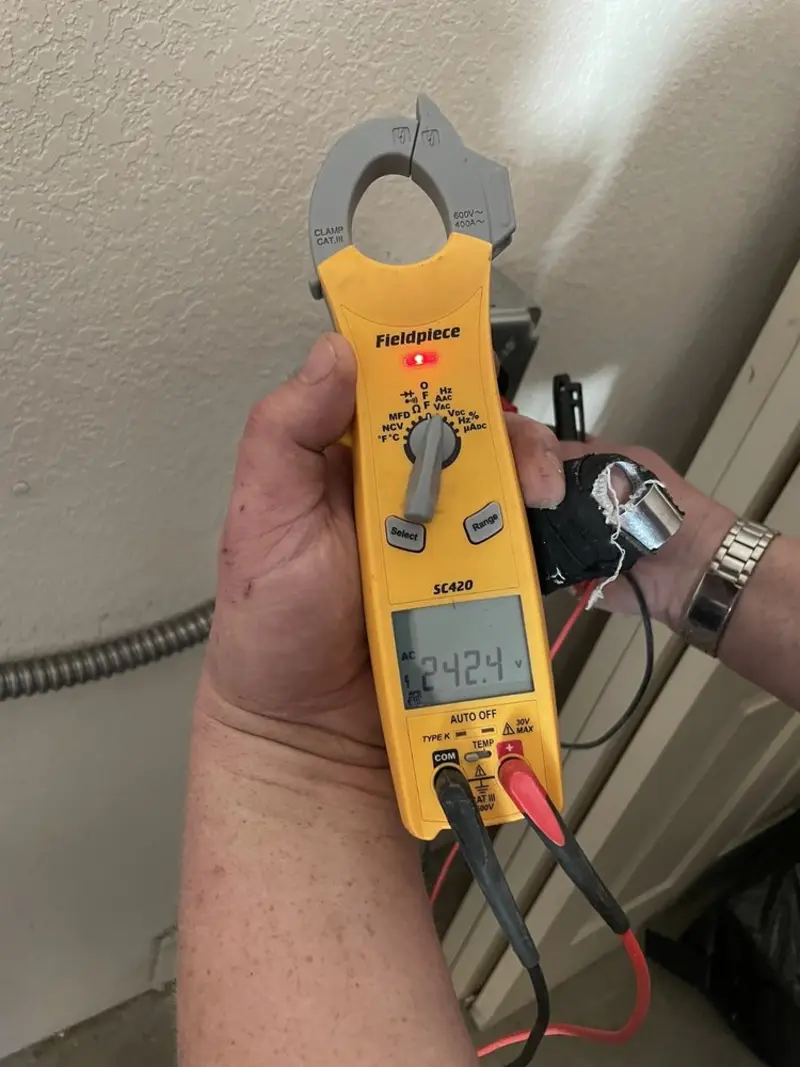 Voltage testing with clamp meter during Recessed Lighting Installation in Big Stone Gap